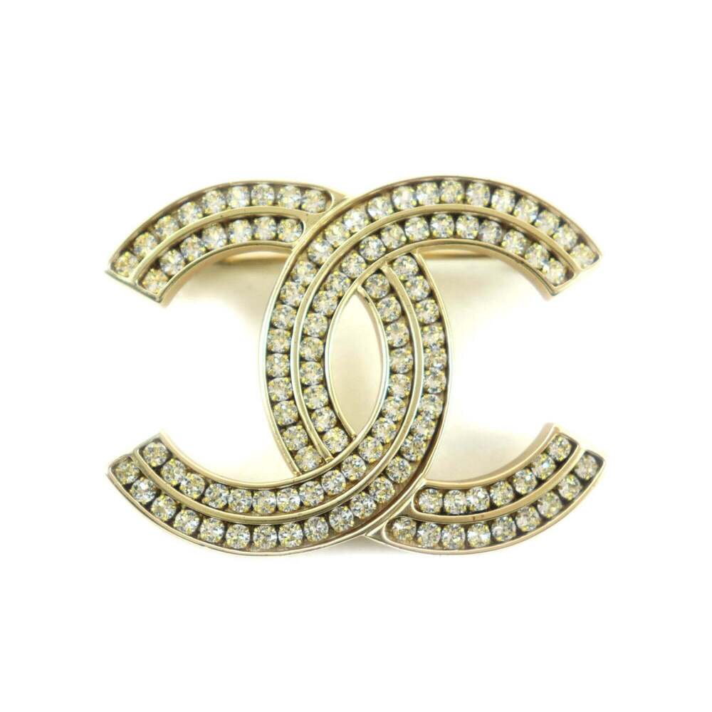 CHANEL Gold Logo Brooch